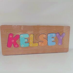 “KELSEY” WOOD NAME PUZZLE*NEW!*14”x 6”. So cute. Still in wrapping. See pics.